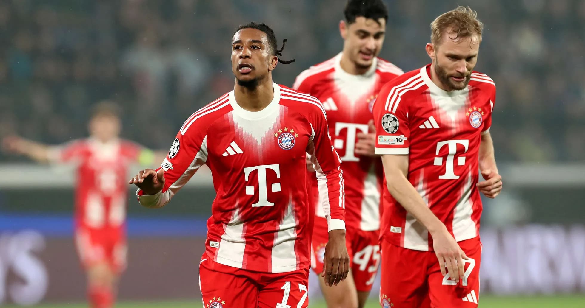 Bayern München players celebrating during Champions League match