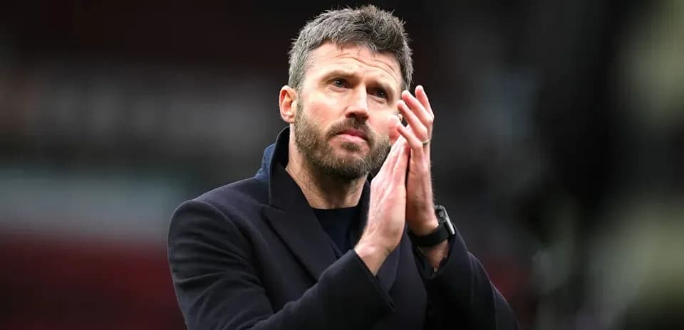 Coach applauding fans after the match