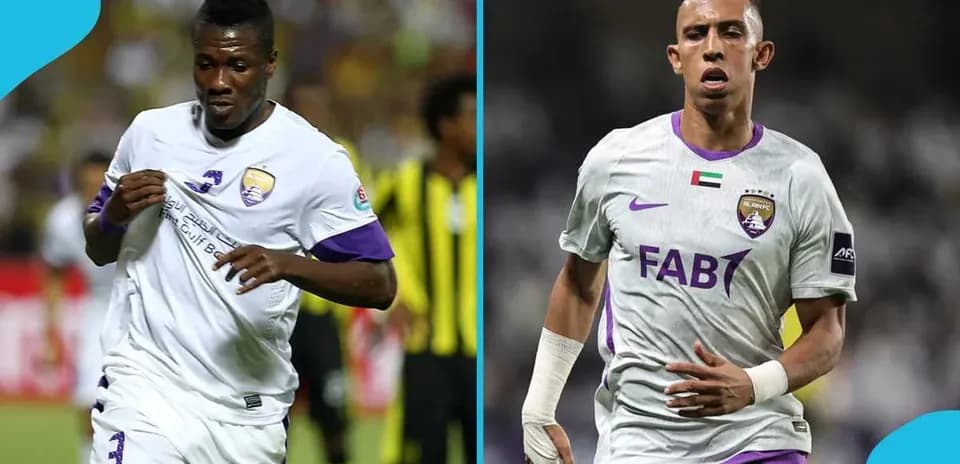 Two players from Al Ain FC running on the field