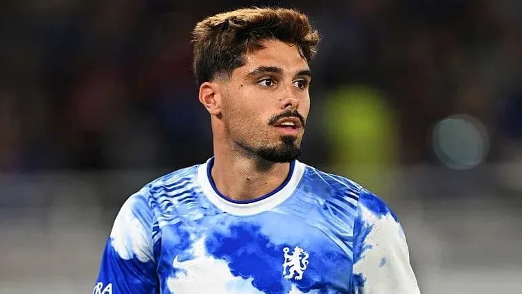 Player in Chelsea jersey during match warm-up