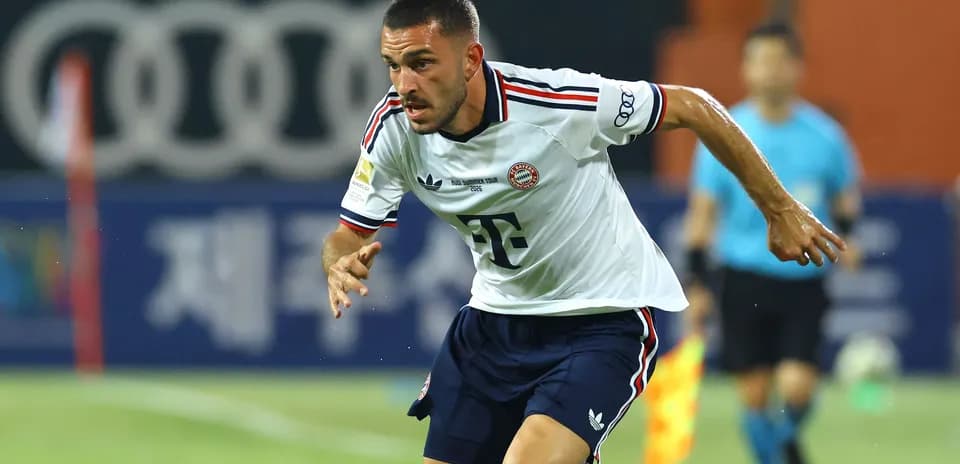 Player running during Bayern Munich match action