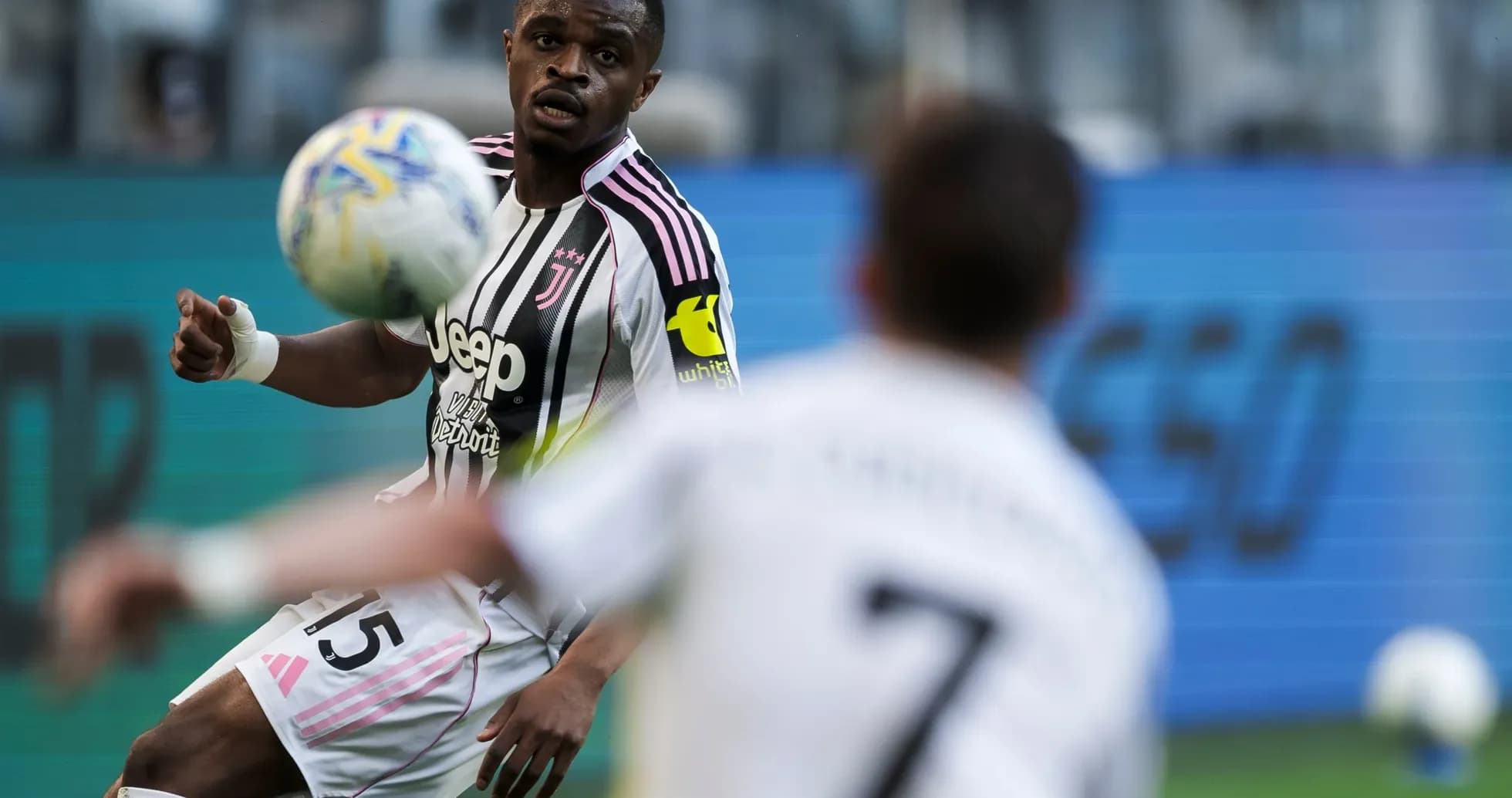 Juventus player controlling the ball during match