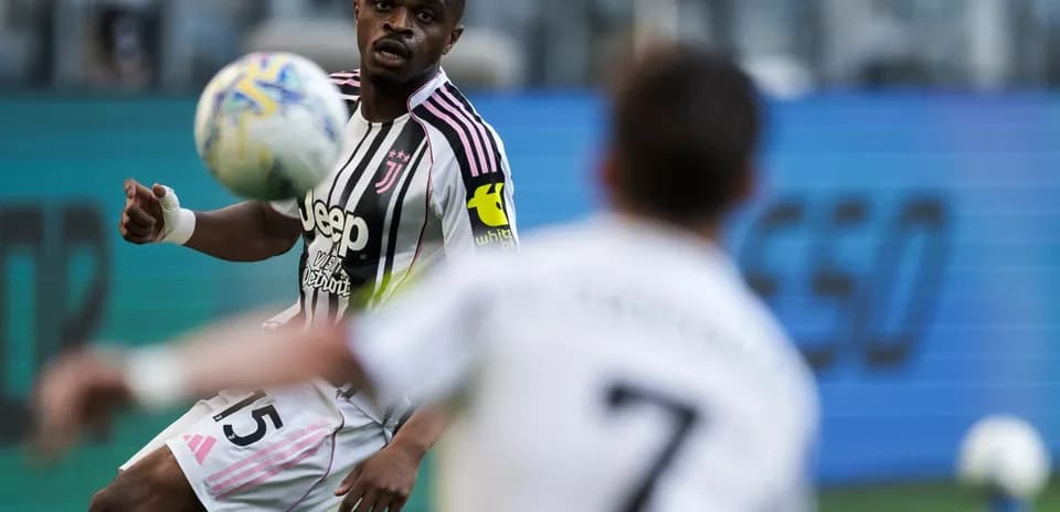 Juventus player controlling the ball during match