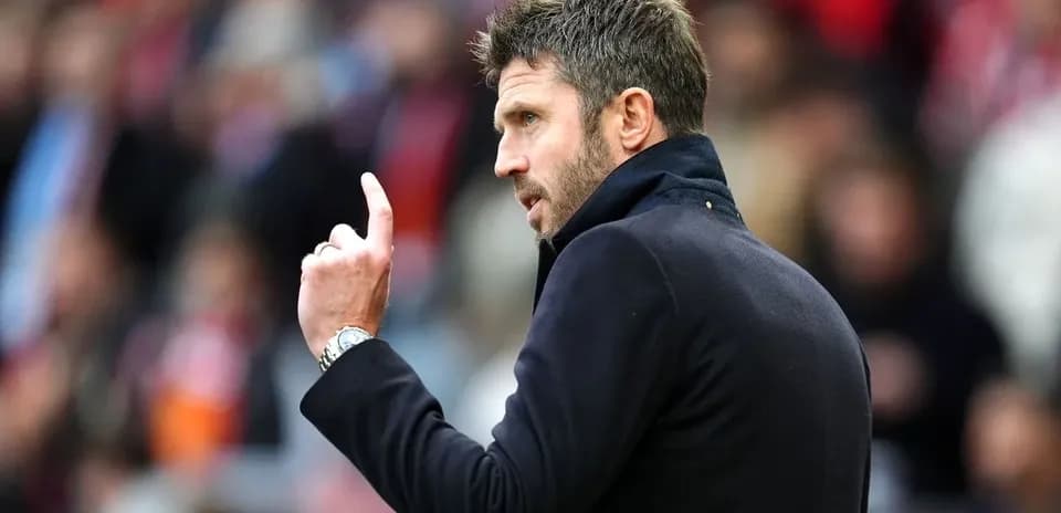 Manager giving instructions on the sideline