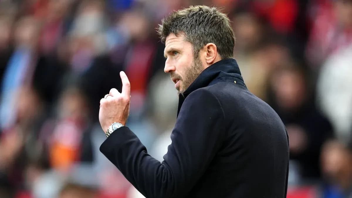 Manager giving instructions on the sideline