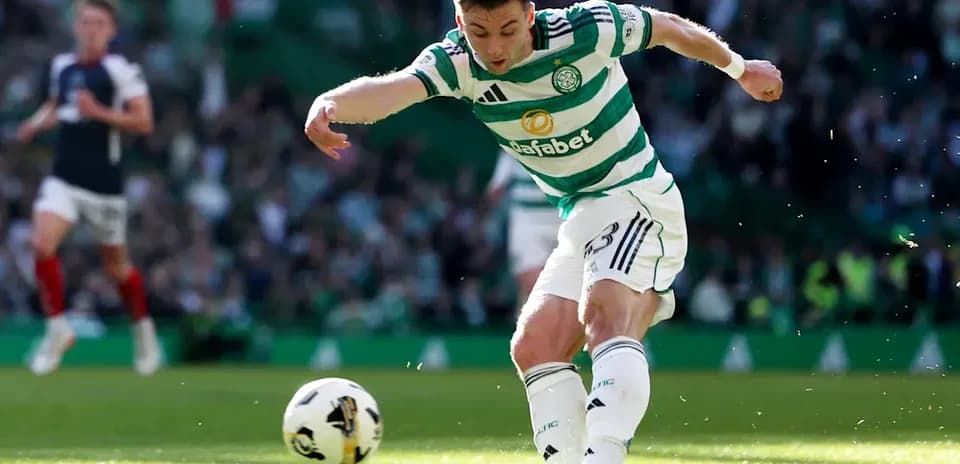 Celtic player kicking ball during a match