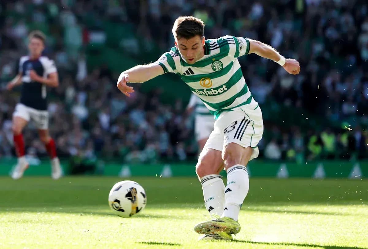Celtic player kicking ball during a match