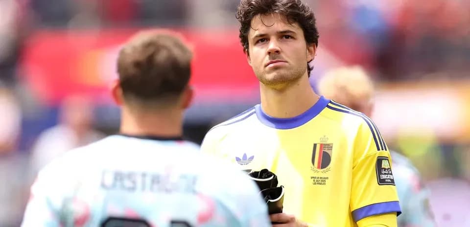 Goalkeeper in yellow jersey looking during warm-up