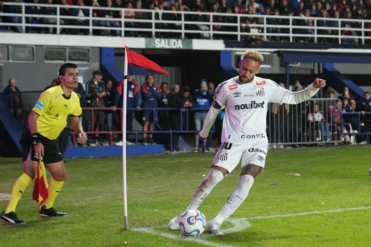 Player taking a corner kick during match