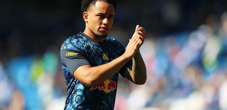 Player applauding fans during match warm-up