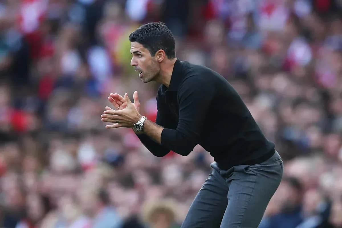 Coach gesturing from the sidelines during match
