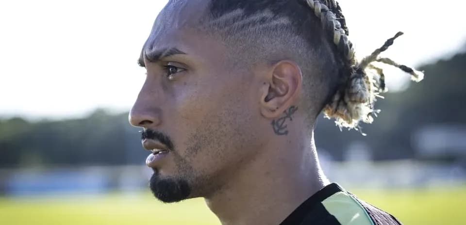 Profile of player with braided hairstyle outdoors