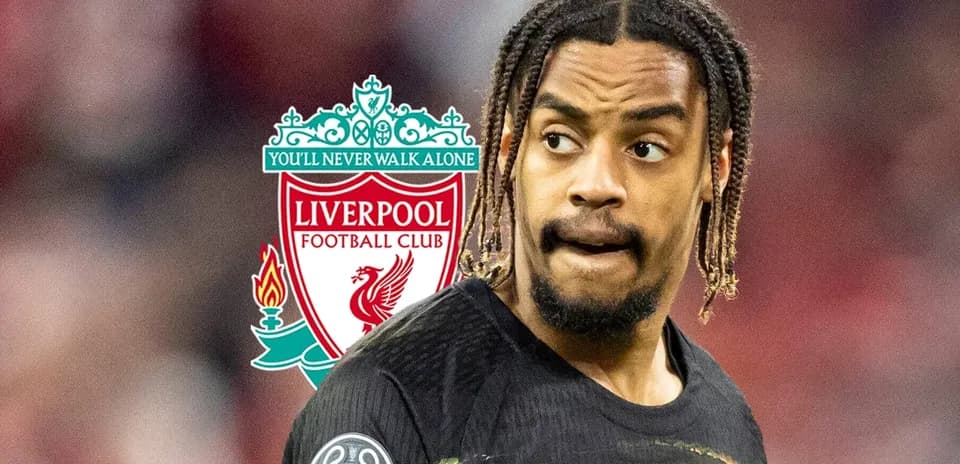 Player in Liverpool jersey with club logo background