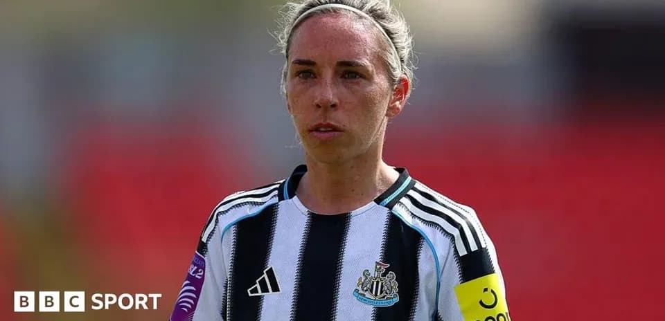 Player wearing Newcastle kit during match preparation