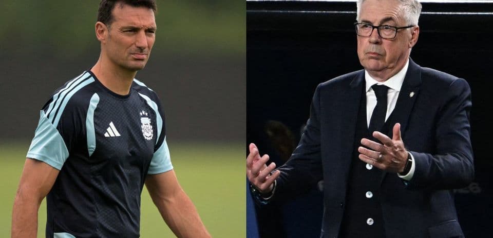 Two football managers during a tactical discussion