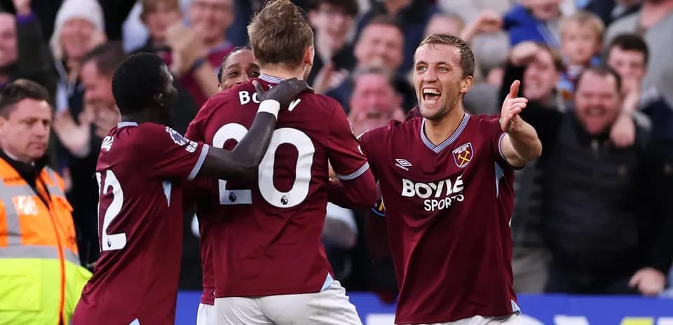 West Ham players celebrating a goal together