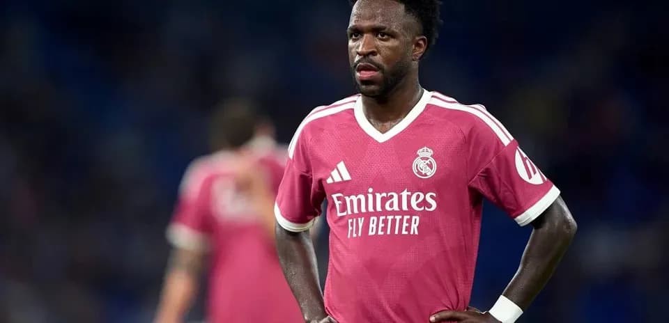 Player in pink Real Madrid jersey during match