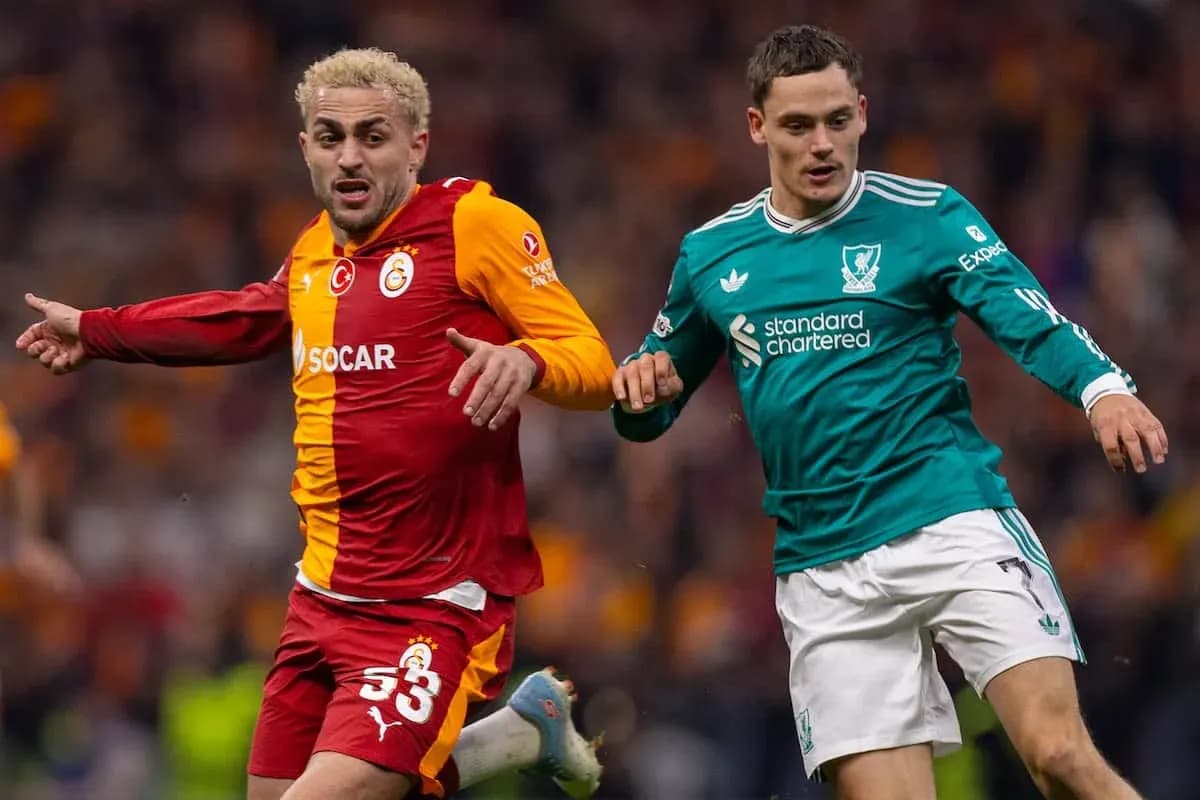 Galatasaray player and Liverpool player competing for ball