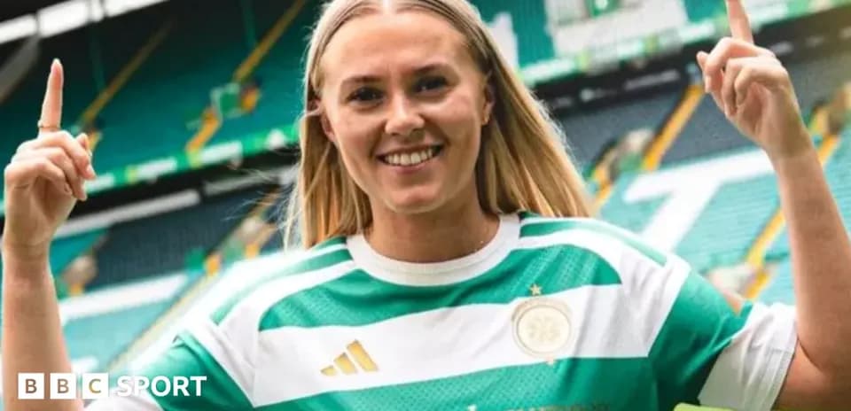 Player posing in Celtic jersey at stadium