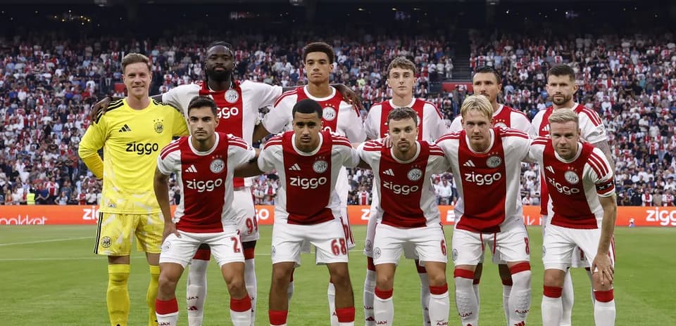 Ajax team posing for photo before match