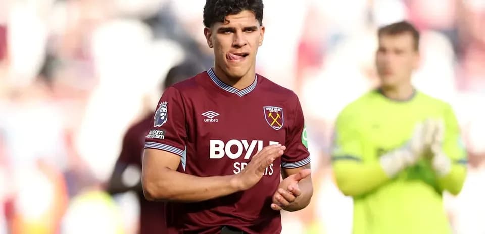 West Ham player clapping to fans after match