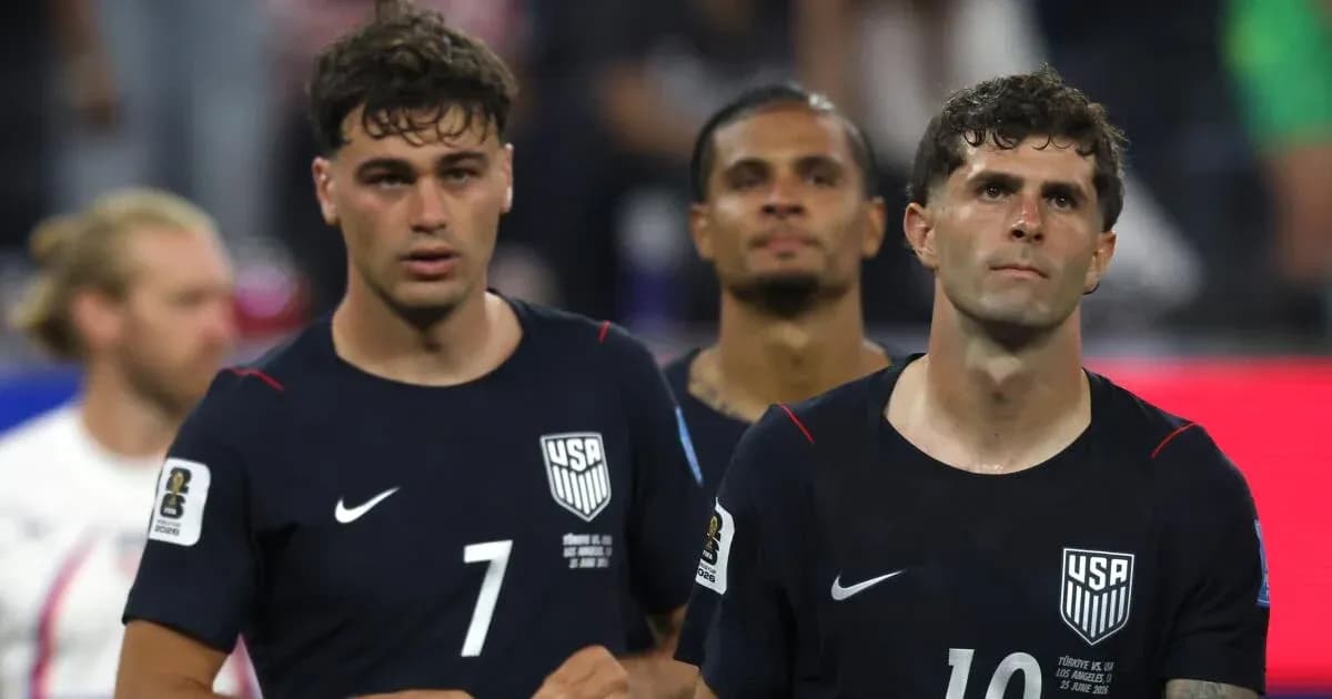 USMNT players walking off the field after match