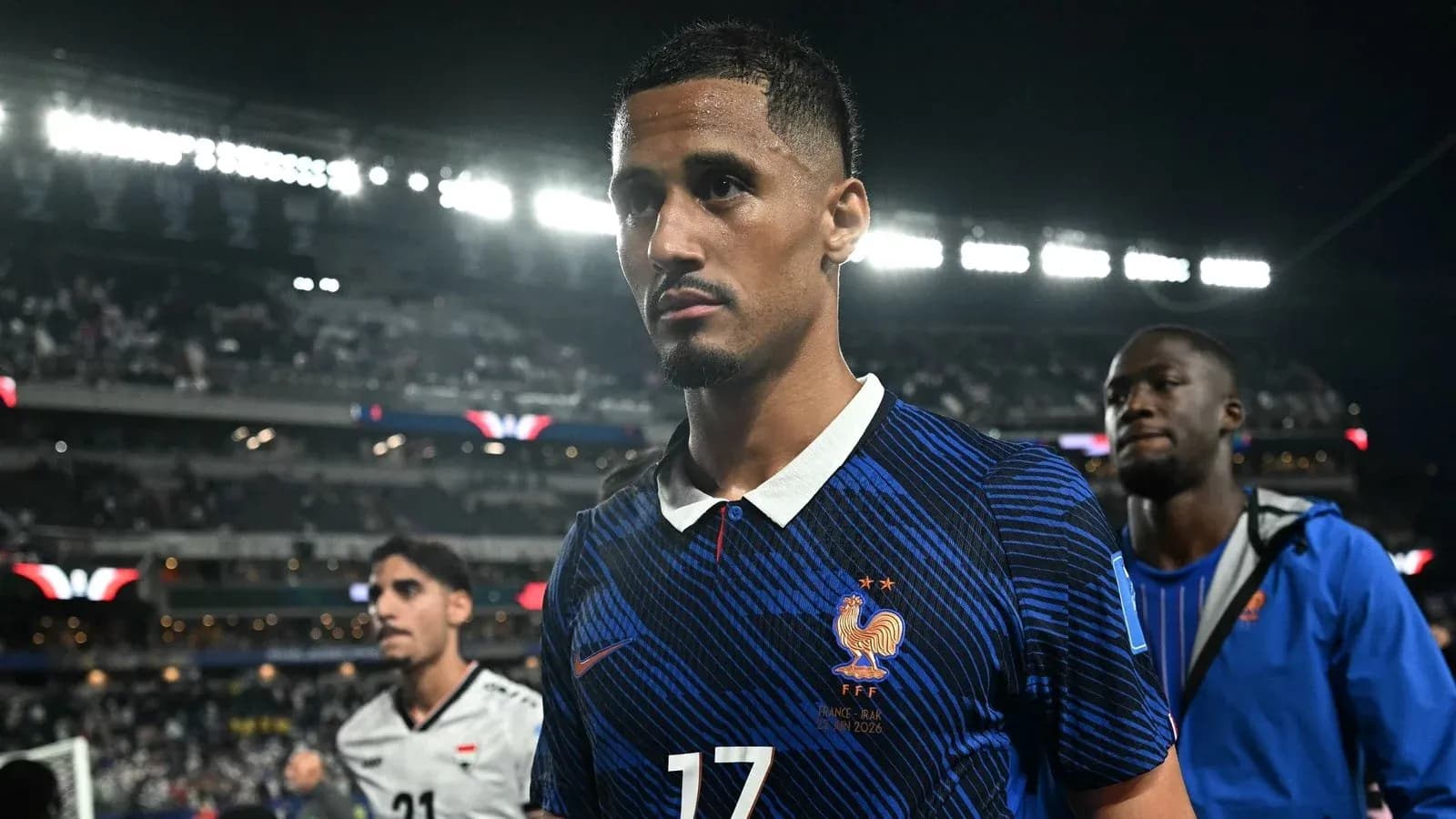Player in France jersey walking off the field