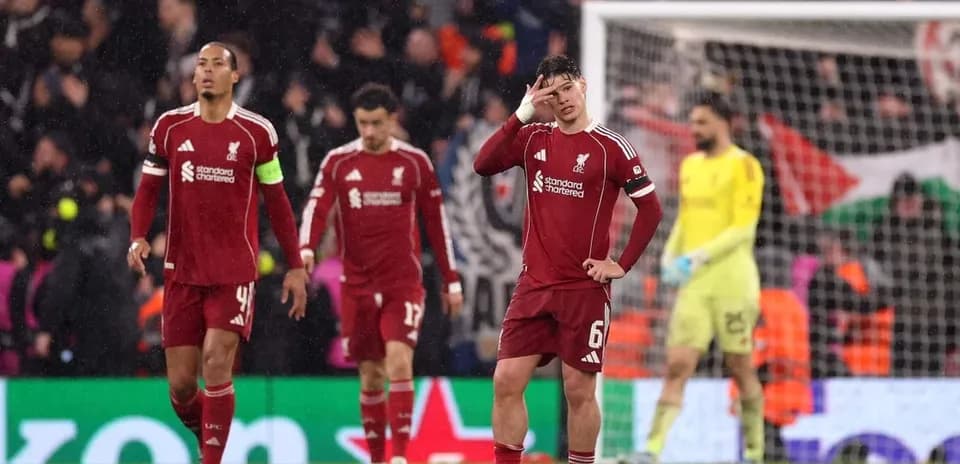 Liverpool players reacting after conceding a goal