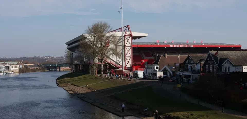 River view of stadium and nearby buildings