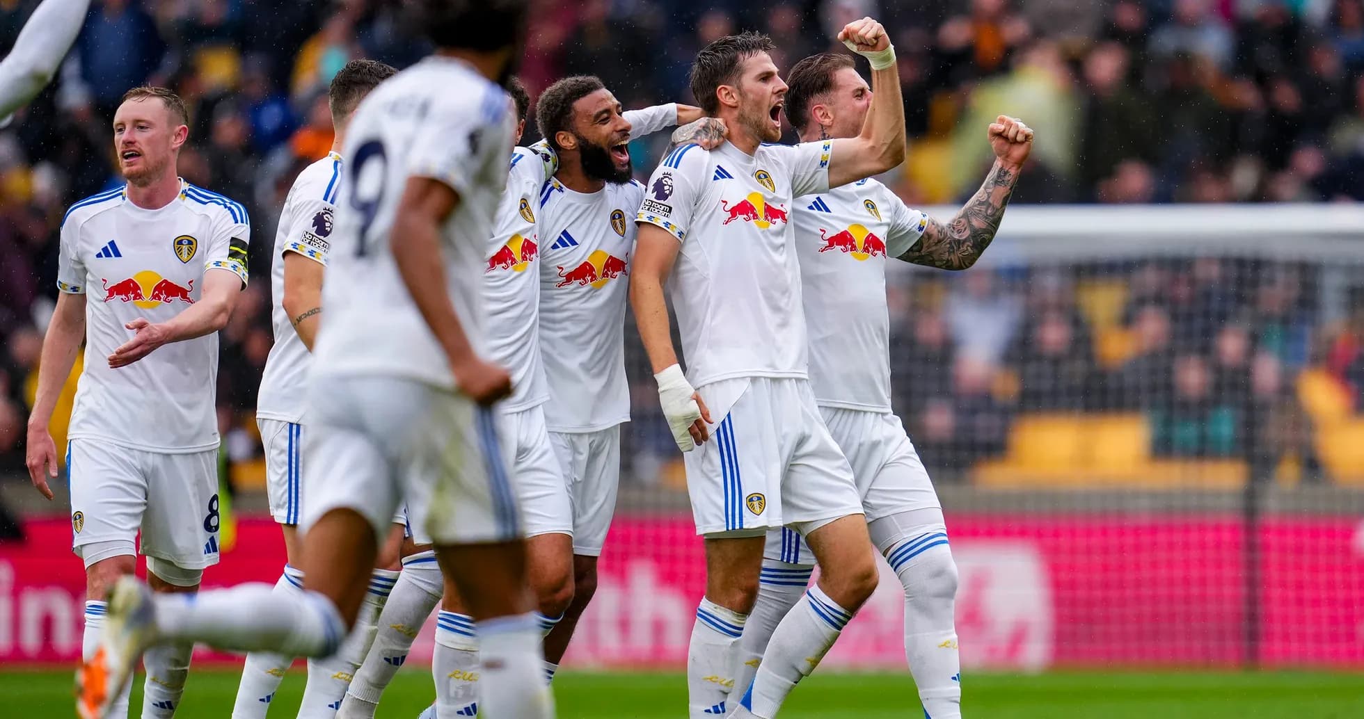 Leeds players celebrating during match against Wolves