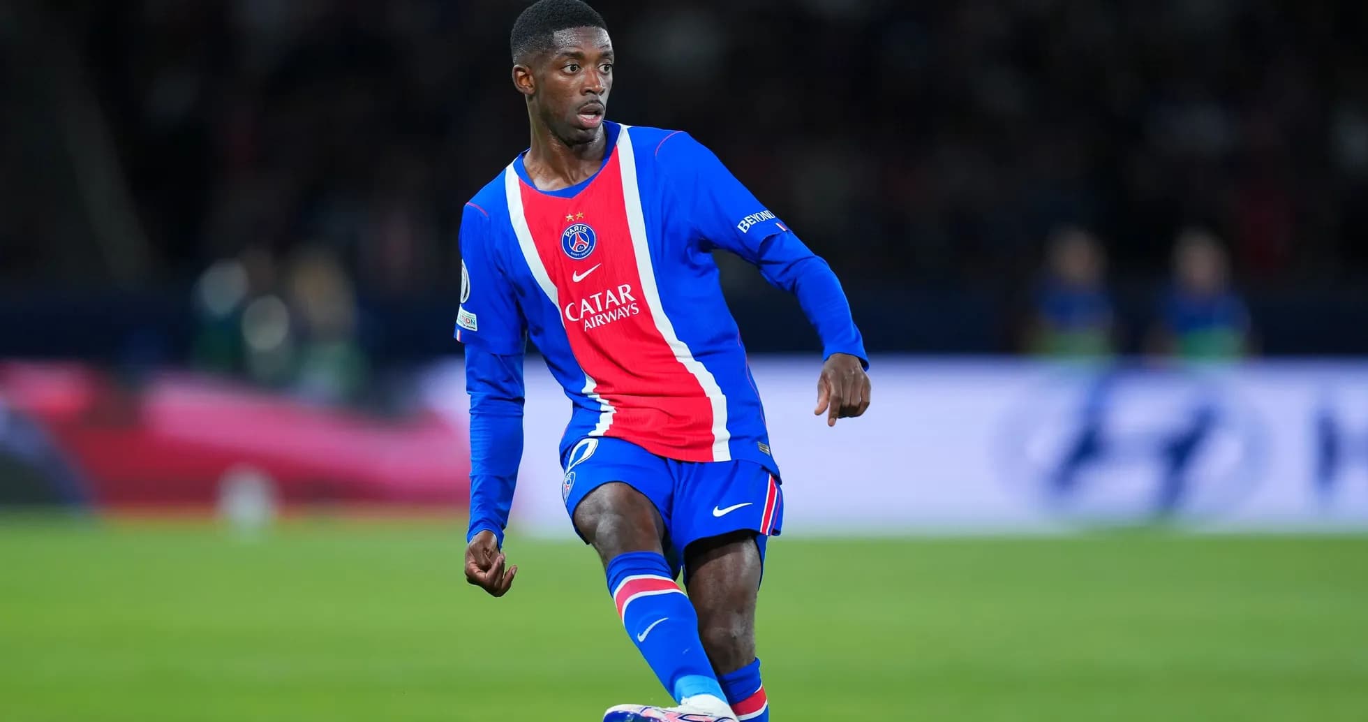 Player in PSG kit during match action