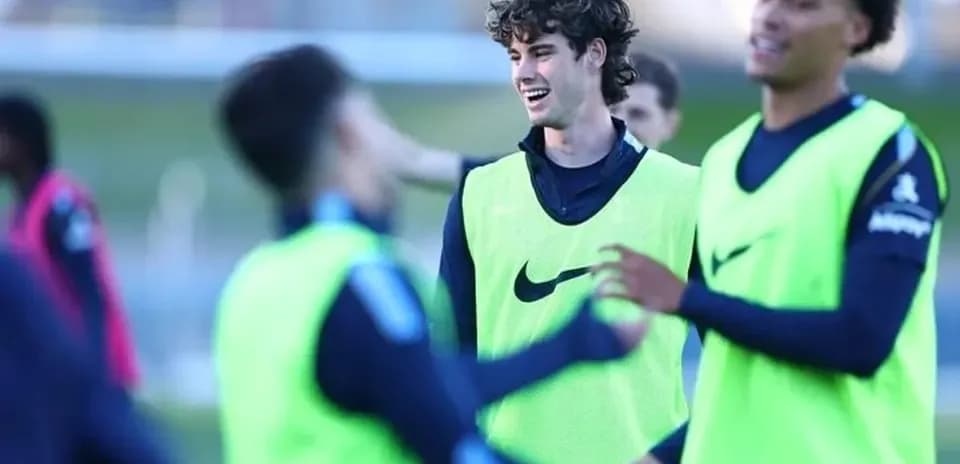 Players wearing training vests during practice session