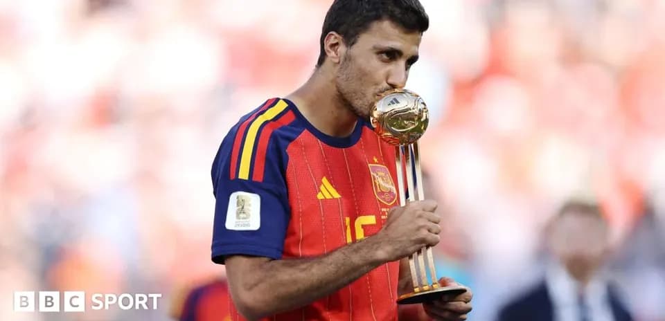Player kissing trophy after winning match