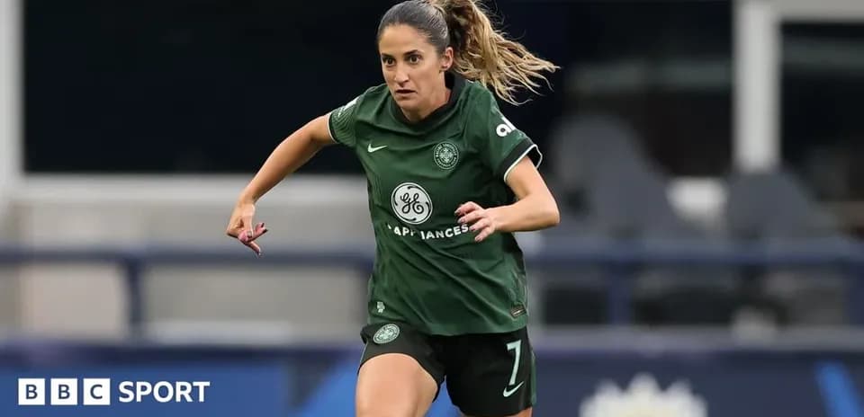 Player in green jersey running on the field