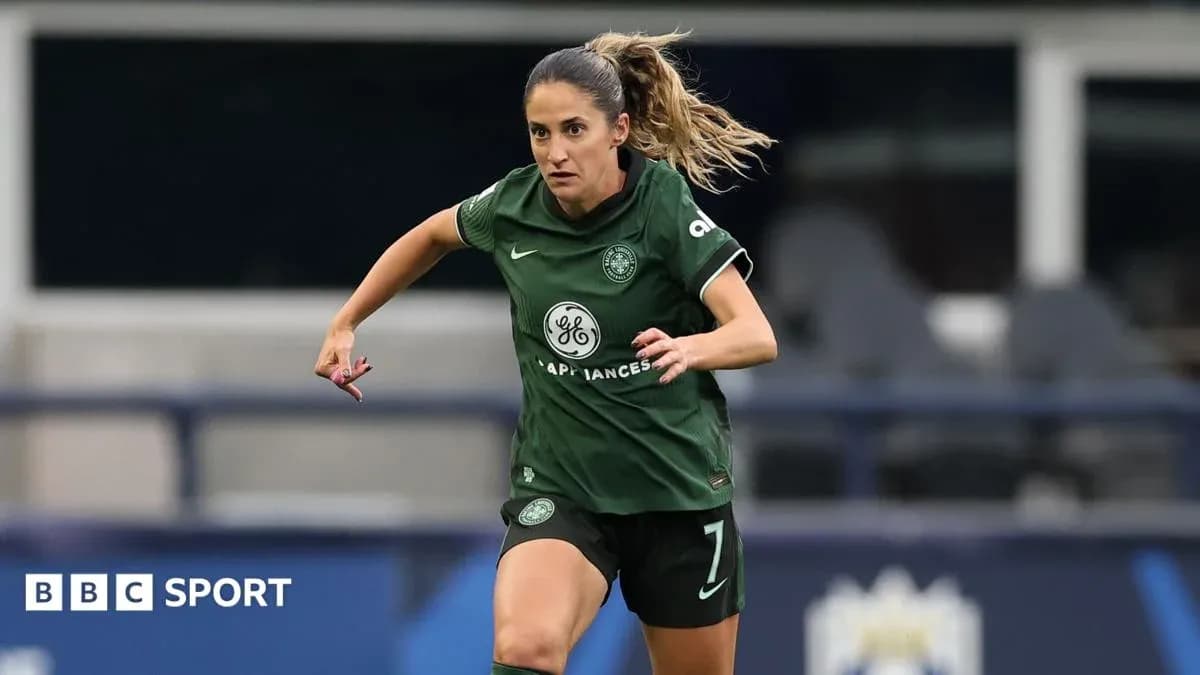 Player in green jersey running on the field