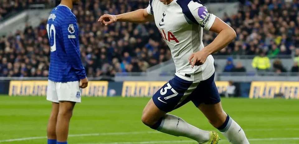 Player celebrating after scoring against Everton