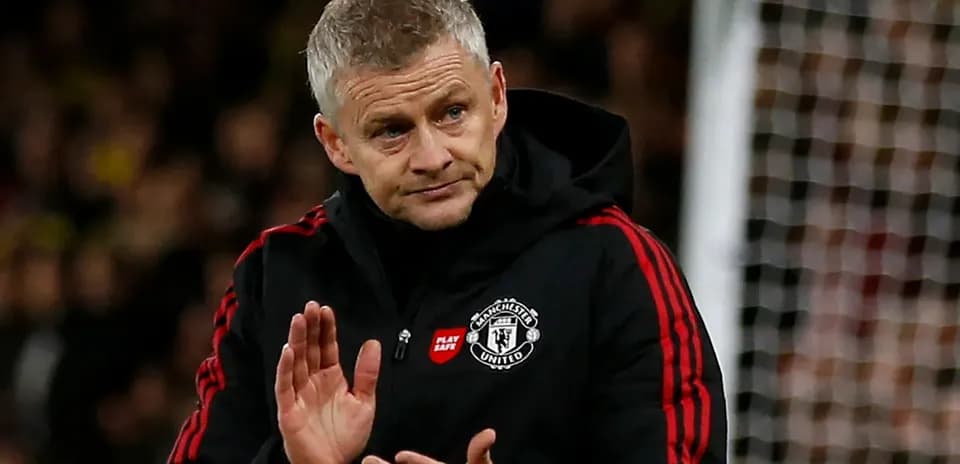 Manager applauding fans during match at stadium
