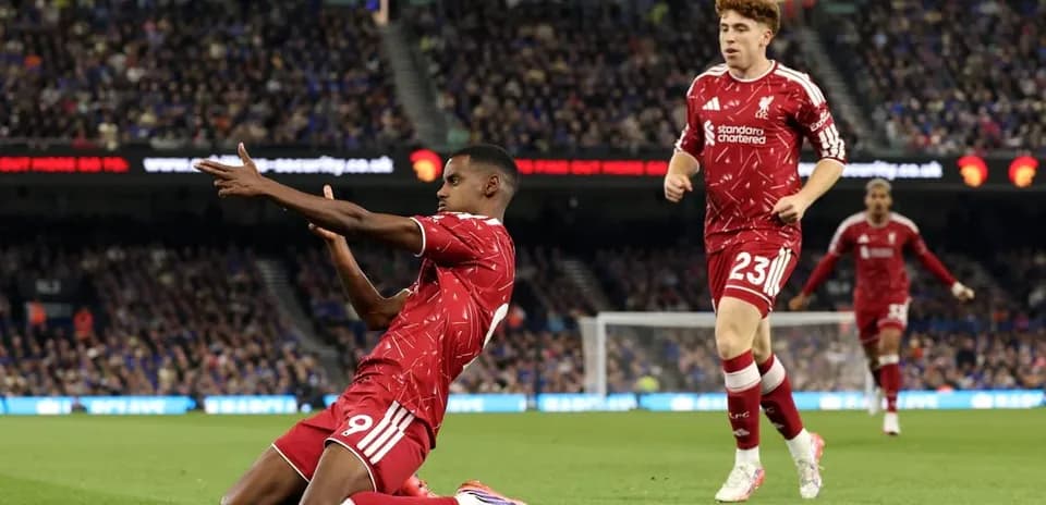 Liverpool players celebrating during a match