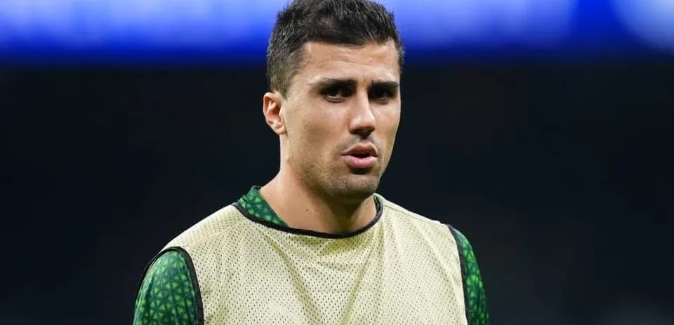 Player warming up on the pitch before match
