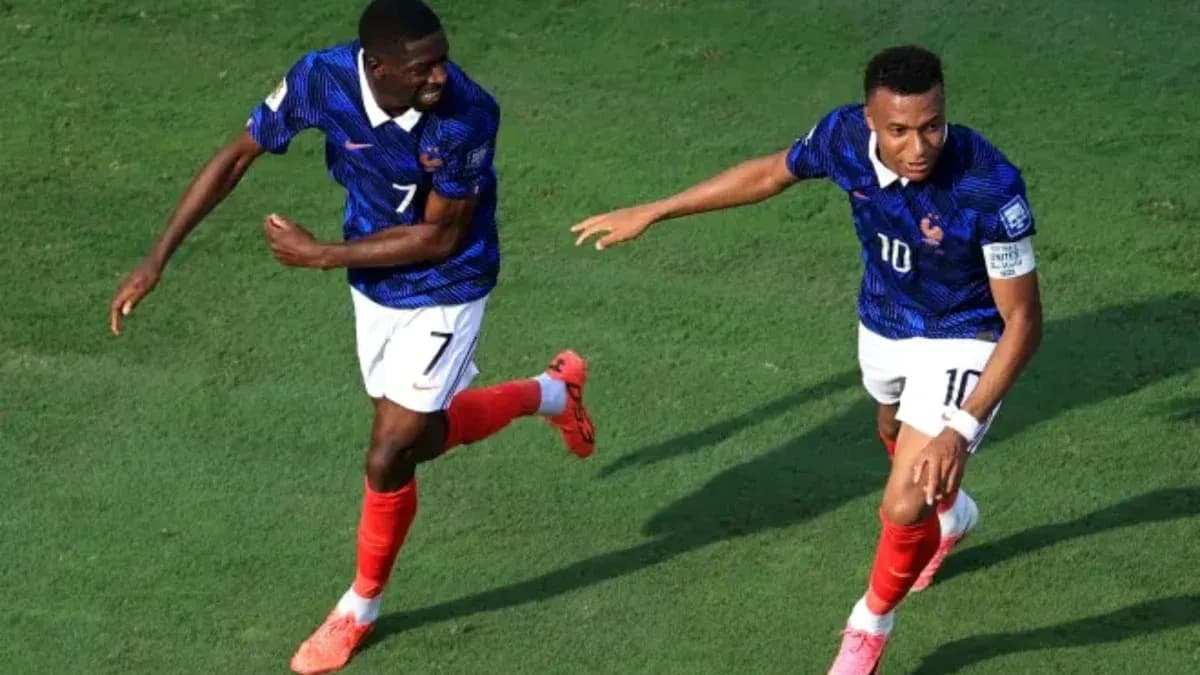 Two players celebrating after scoring a goal