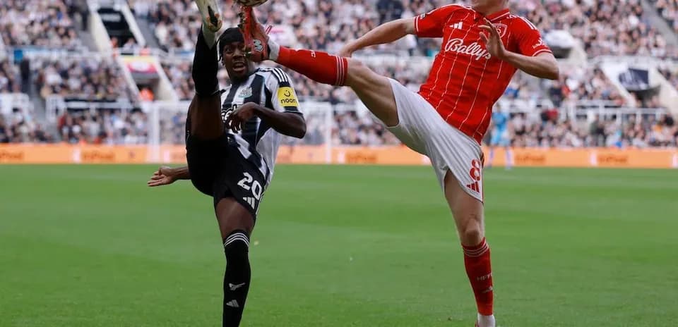 Players contesting for the ball in match