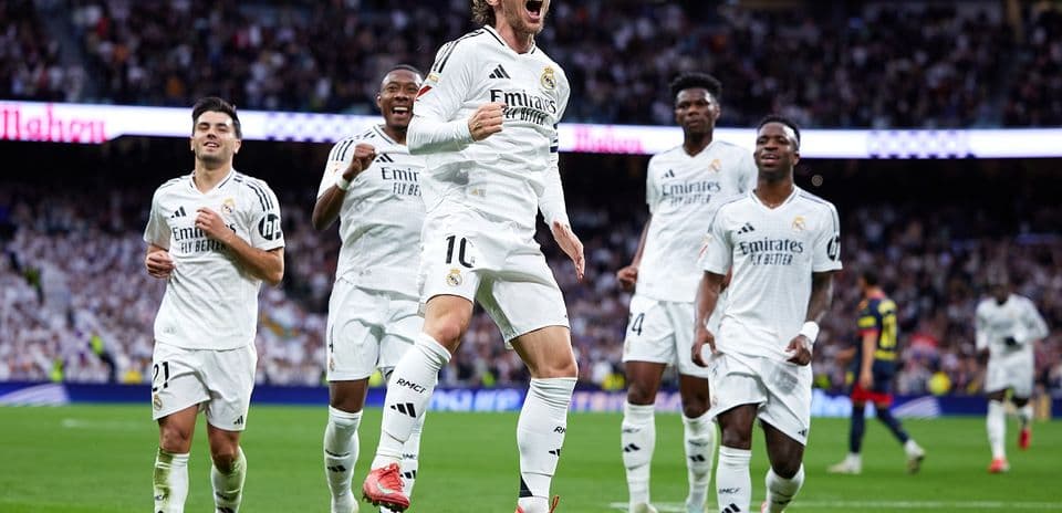 Real Madrid players celebrating a goal during match