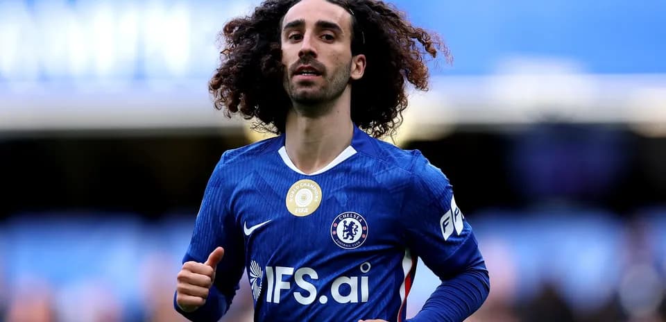 Player running in Chelsea kit during match