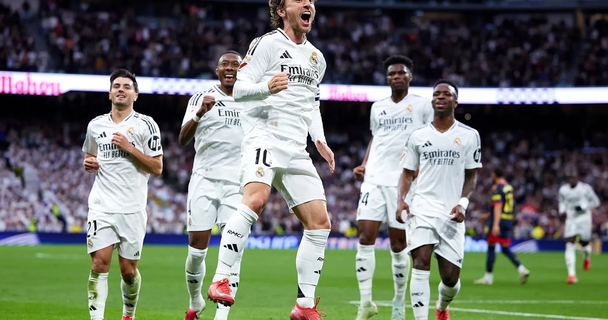 Real Madrid players celebrating a goal