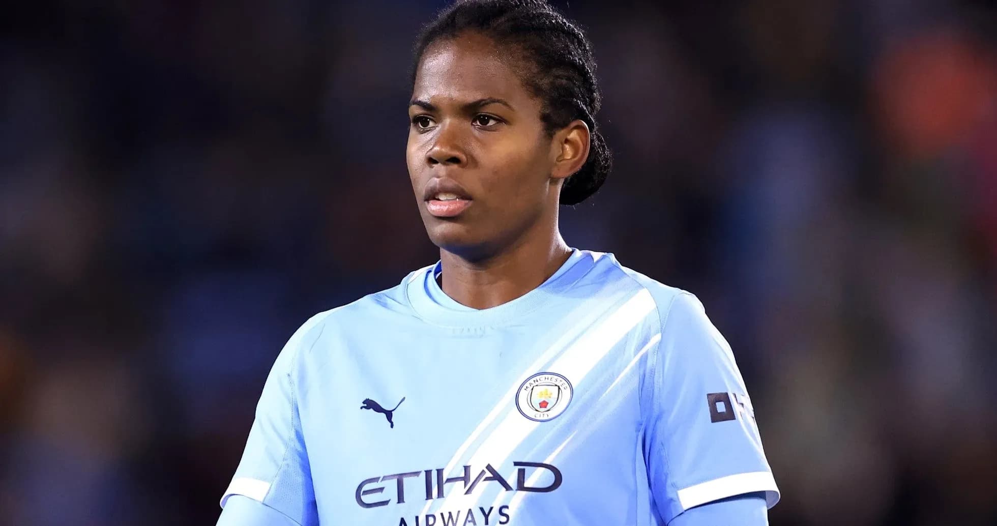 Player wearing Manchester City kit during match