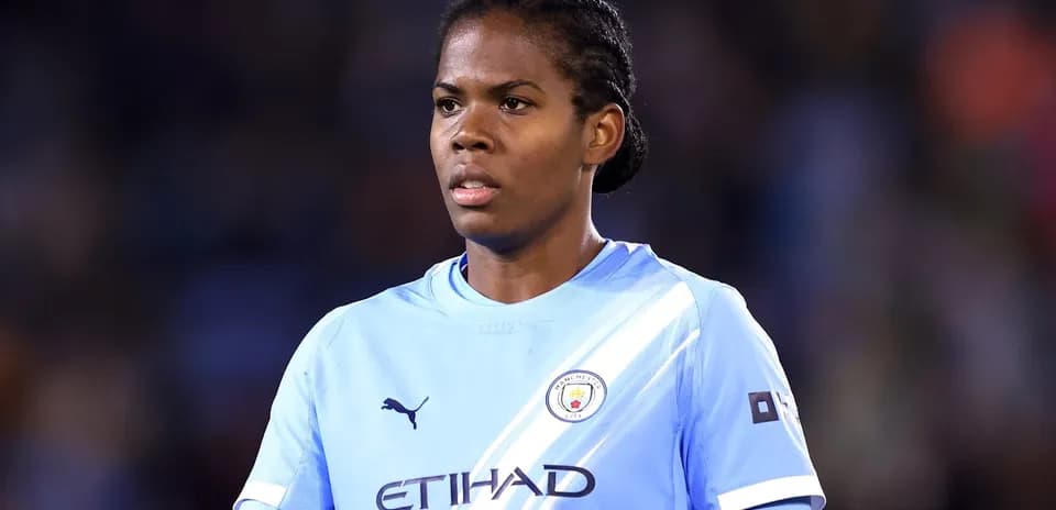 Player wearing Manchester City kit during match