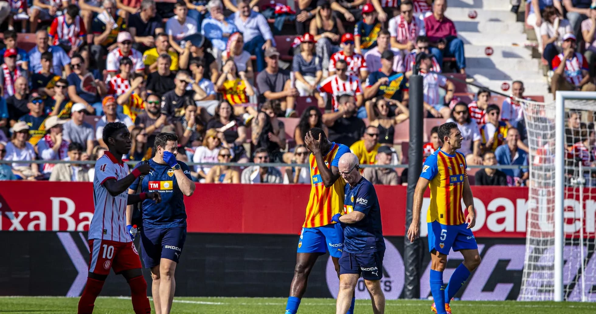 Valencia players interacting during La Liga match