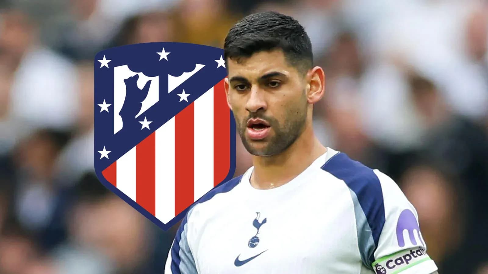 Player wearing Tottenham kit with Atlético Madrid logo