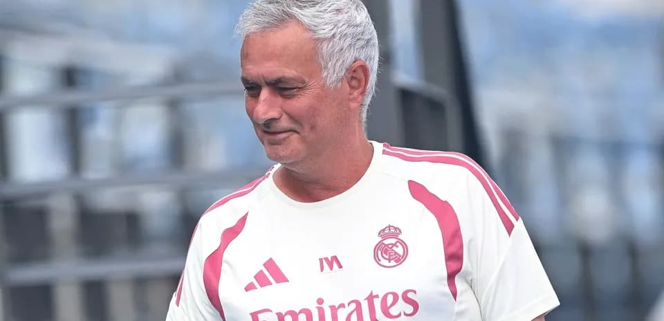 Coach walking during training session at stadium