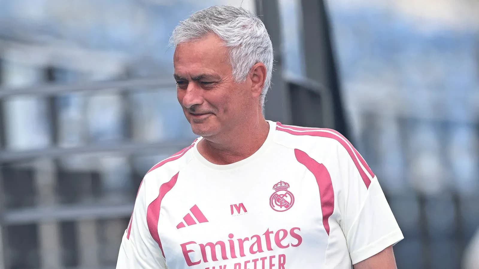 Coach walking during training session at stadium